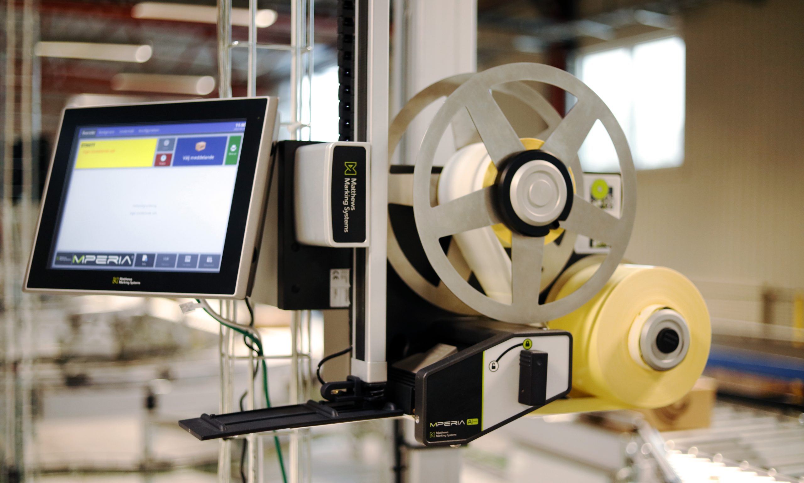 Modulare Bauweise der A-Serie Etikettiersysteme: Etikettendrucker und Etikettenspender in einem kompakten und sicheren Gerät.
