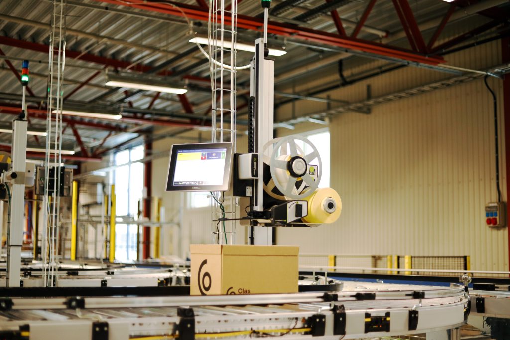Print-and-Apply Labeling Machine in distribution center