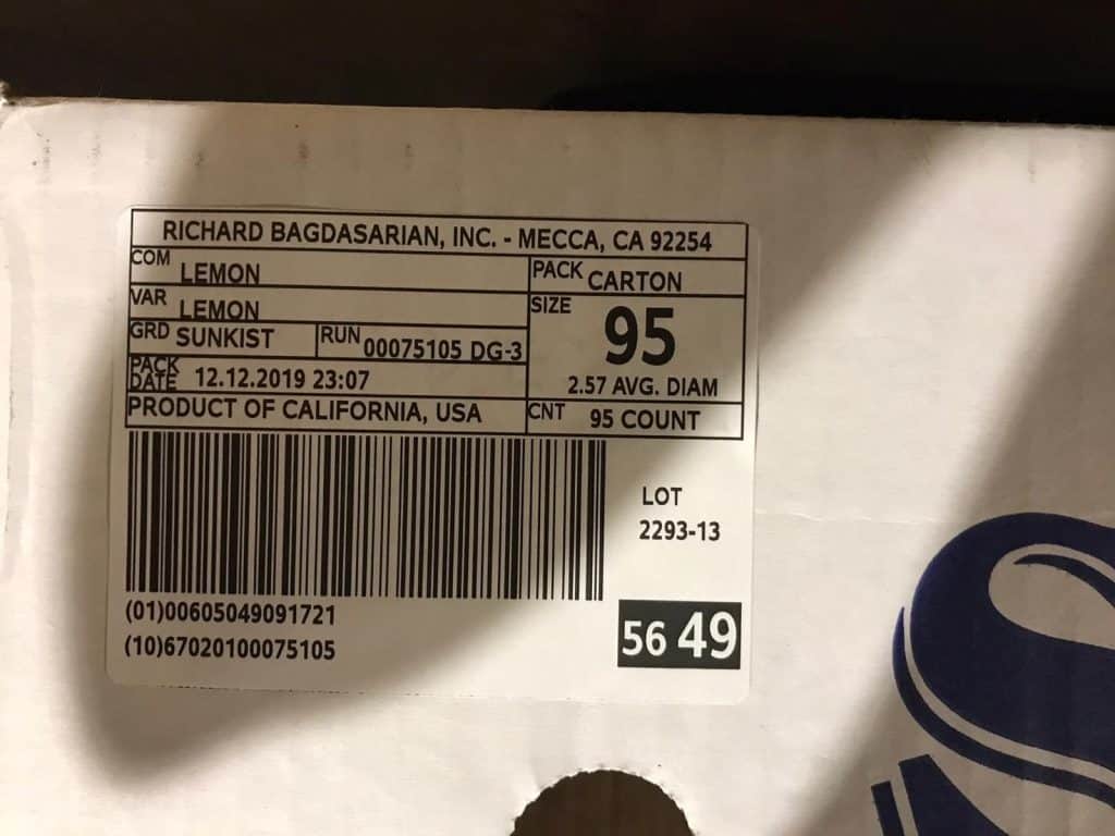 Ein von Richard Bagdasarian, Inc. gedrucktes Etikett auf einer Schachtel mit Zitronen.